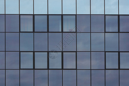 现代建筑的墙壁和窗子蓝色建筑背景摘要图片