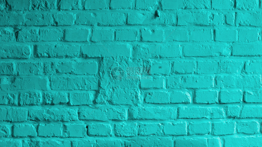 用灰浆绿松石色特写的砖墙背景图片