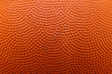 橙色篮球纹理的特写背景图片