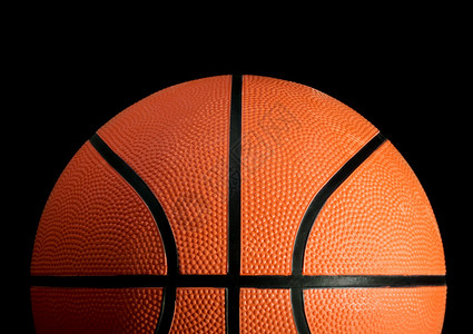 黑色背景上的篮球图片背景图片