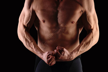 六块腹肌强壮的运动家伙展示他的躯干健美运动健身锻炼积极的生活方式脱毛图片