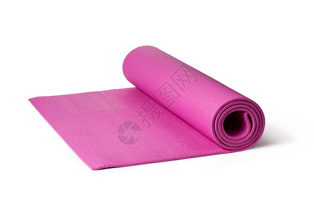 白色背景上的粉色瑜伽垫图片