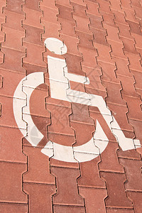 带有品牌轮椅的残疾人驾背景图片