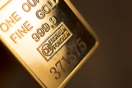 9999一盎司的金块吞噬贵金属背景图片