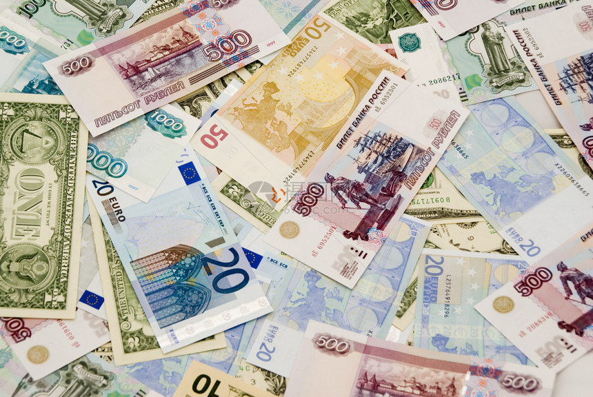 美元欧元卢布钞票的背景图片
