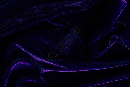 深紫色纺织品为背图片