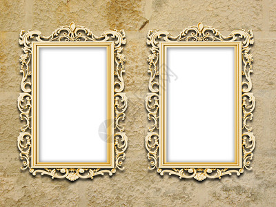 两块金色的巴洛克框挂在土黄色混凝背景图片
