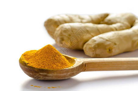 姜黄粉姜黄或姜黄是使咖喱呈黄色的香料它在印度被用作香料和药草已有图片