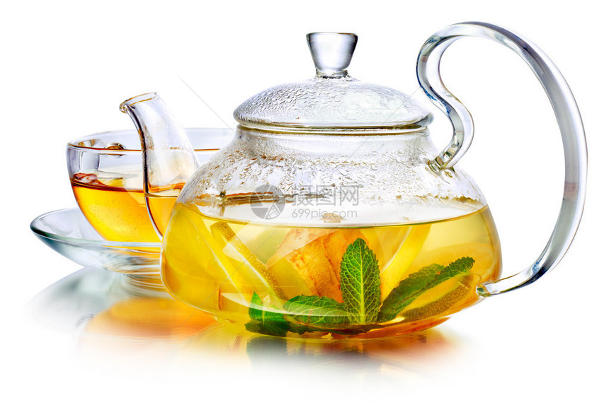 含姜和薄荷的热草药茶在透明的茶壶图片