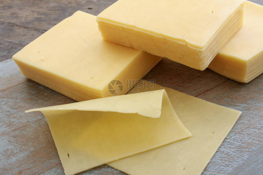 切片美味的奶酪部分图片