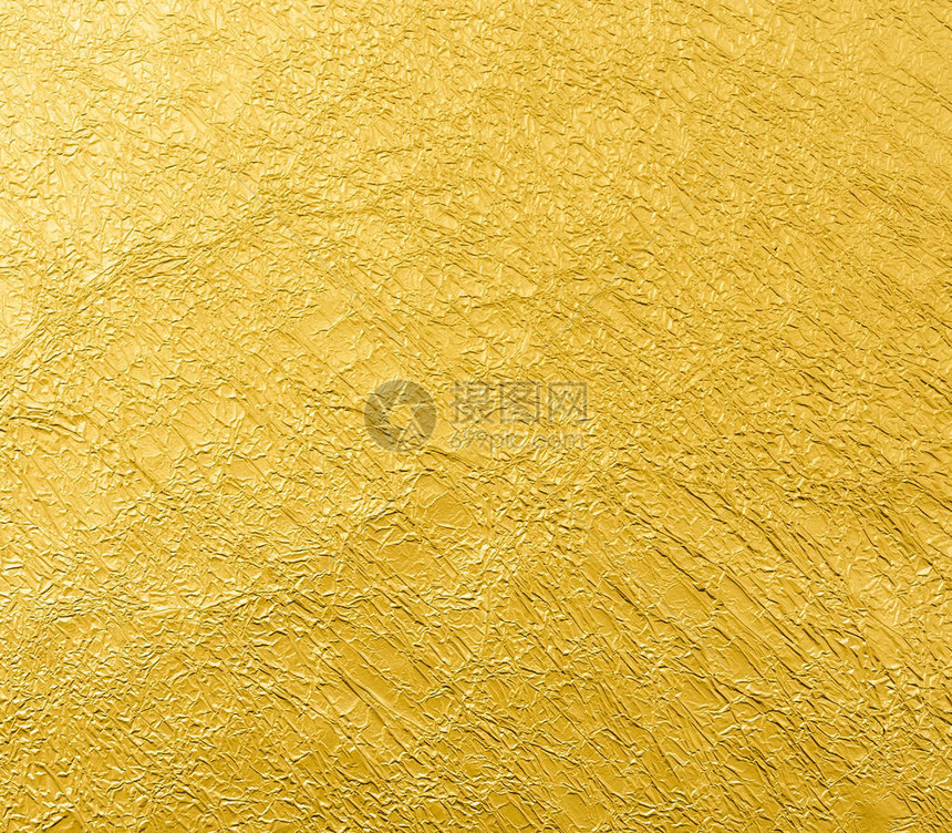 表面有光泽的不平整表面的金箔叶背景片图片