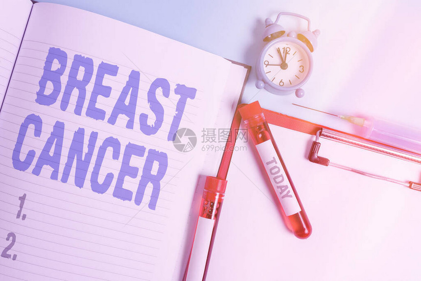 显示乳腺癌的书写笔记乳房细胞生长失控的疾病的商业概念血样小瓶医疗图片