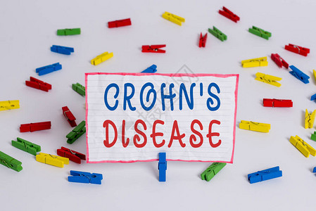 显示克罗恩病的概念手写概念意义肠道慢炎症疾病彩色衣夹纸空提图片