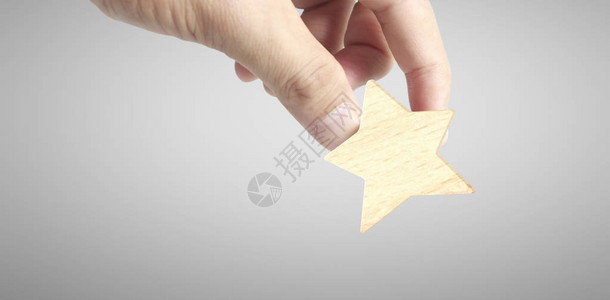 增加木五星形状的手最佳卓越的商业服务评级背景图片