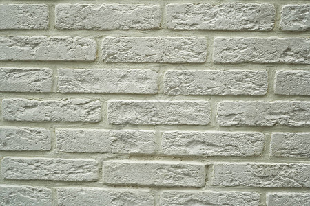 沙石砖墙背景的近抽象模式图片