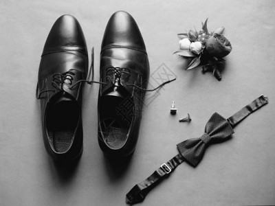 男子的结婚饰品鞋子袖扣领结背景图片