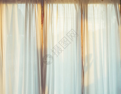 早上的白色窗帘室内装饰背景图片