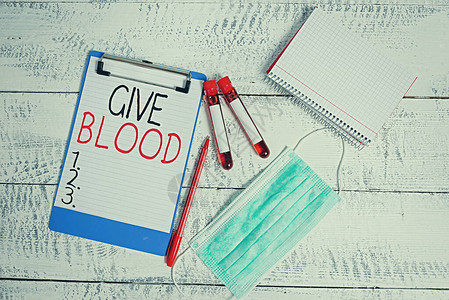概念手写显示献血概念意味着个人自愿抽血并用于输血样小瓶医疗图片
