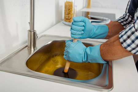 用橡皮手套清洗水槽的防推机挡塞橡胶手套清洁器对水管图片