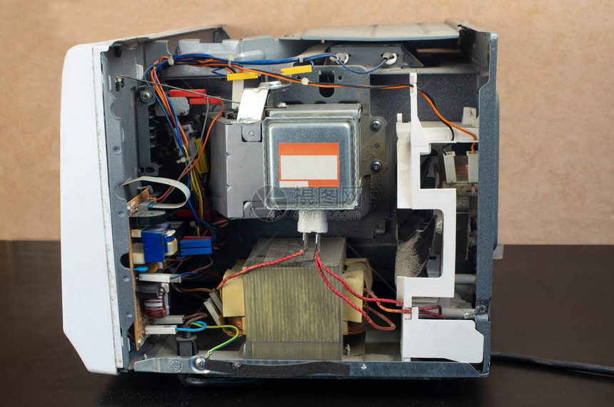 修理微波炉维修家用电器除去侧面板的微波图片