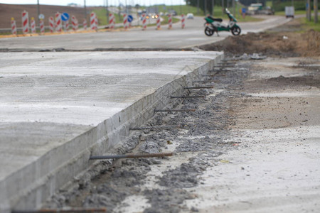 联合扩建水泥路的建设洗背景图片