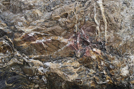 Marble悬崖表面天然石块自然颜色和美丽地表时经图片