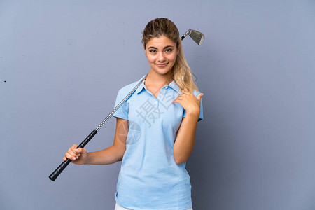 灰墙上高尔夫高尔夫女孩面部图片
