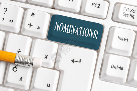 手写文本提名提名或州被提名为奖品的概念照片动作白色pc键盘图片