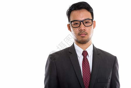 年轻亚洲商人戴眼镜的图片