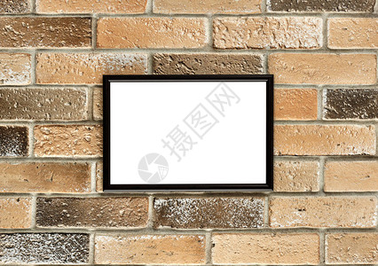 一个带有白色空白间的相框挂在旧砖墙上Grunge砖墙图片