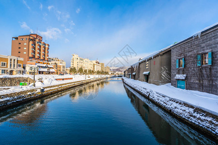 日本北海道冬季和雪季的大田运河风景美背景图片