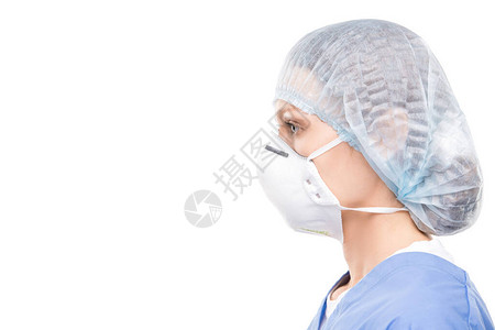 白色背景保护面罩和外科手术帽女医学专家的侧面观点图片