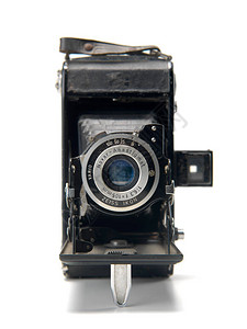白色背景上的老式相机图片