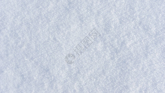 白色纯白闪亮的雪幕背景纹理蓝调的新雪纹理图片