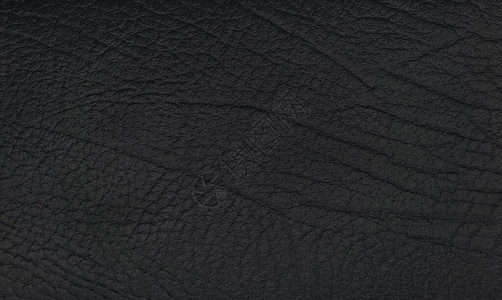 黑色天然卷状皮革纹理宏有型态的黑物图片