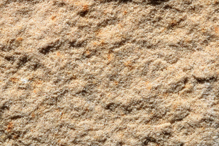 沙石纹理背景的详情石图片