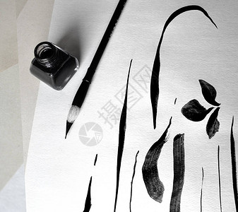 线条是用黑色墨水和毛笔在白纸上绘制的高清图片