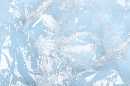 蓝色背景上的塑料包装聚丙烯袋聚乙烯包装塑料污染概念顶视图图片
