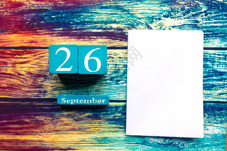 9月26日木制日历和木制背景白模型背景图片