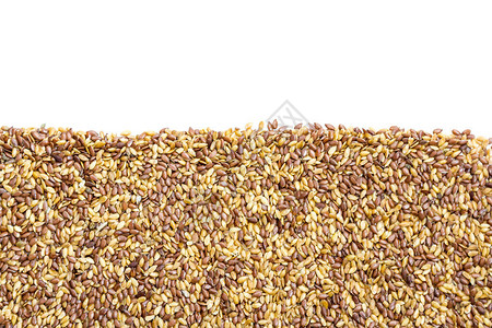 混合种籽金和棕褐菜籽背景图片