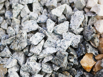 灰色的小鹅卵石背景由灰色的小鹅卵石组成有许多可能的用途纹理由灰色调的图片