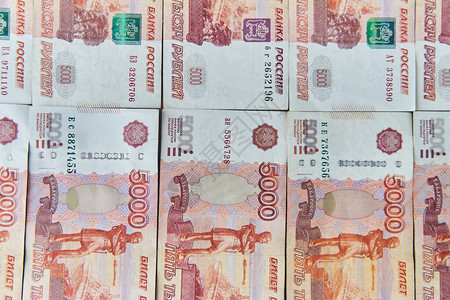 俄罗斯的钱五千零一千张纸币上的俄罗斯卢布特写财务概念图片