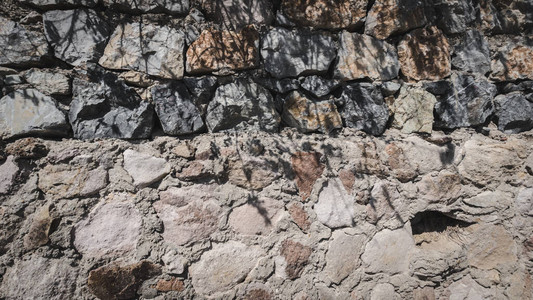 天然石材砖墙背景和纹理照片图片