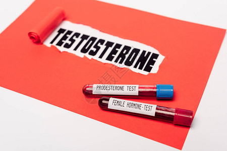 近红纸附近有孕酮和雌激素血液样本的测试管近视观察背景