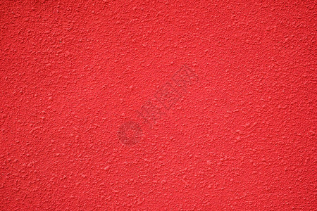 粗糙纹理表面的墙壁红色纯背景背景图片