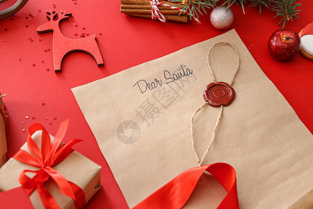致圣诞老人和圣诞节装饰人的信背景图片