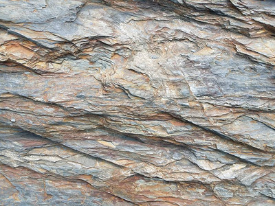 灰色和红色岩石或头或巨石地质近距离图片