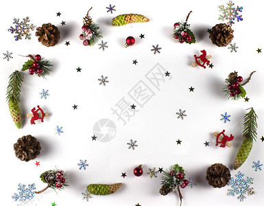 圣诞装饰背景与冷杉球果和树枝球和雪花从上面平铺的圣诞主题壁纸圣诞平图片