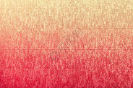 带垂直梯度宏观的横纹红纸和黄纸珊瑚纸板背景的条形图图片