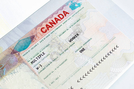 护照封口的加拿大工作签证图片
